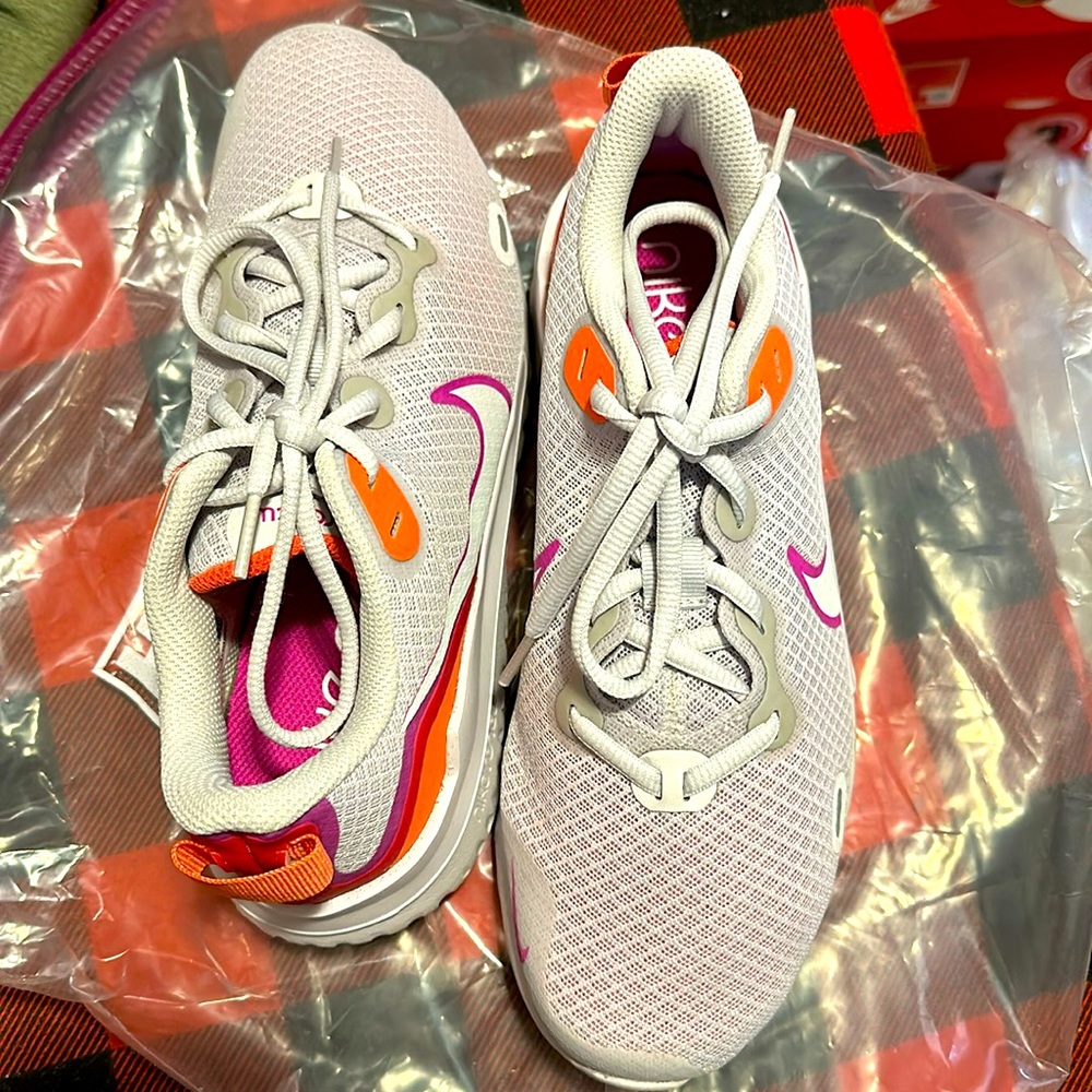 Nike Renew sneakers worn once but still in excellent condition